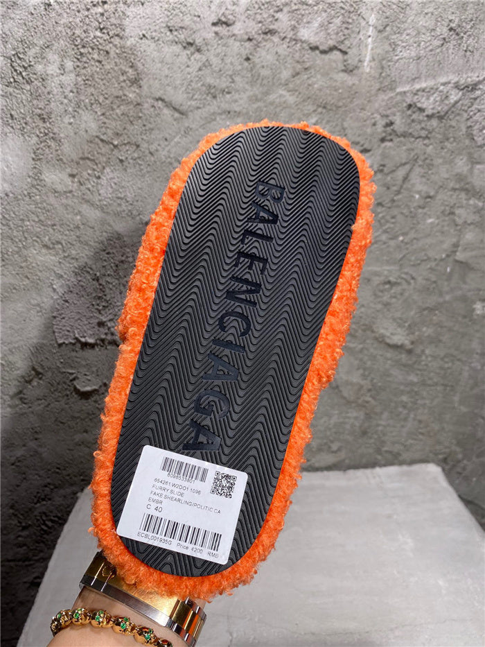 Balenciaga black furry slides orange