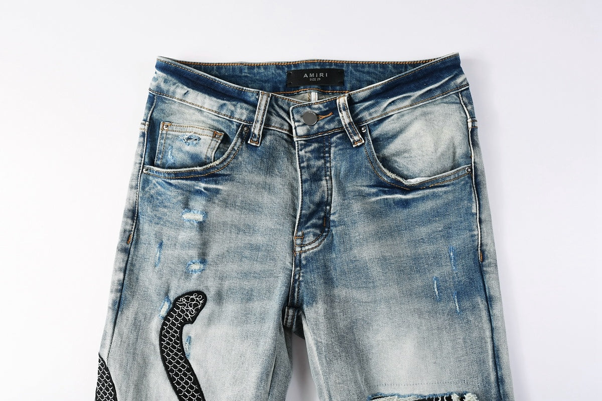 Amiri jeans light blue with back snake