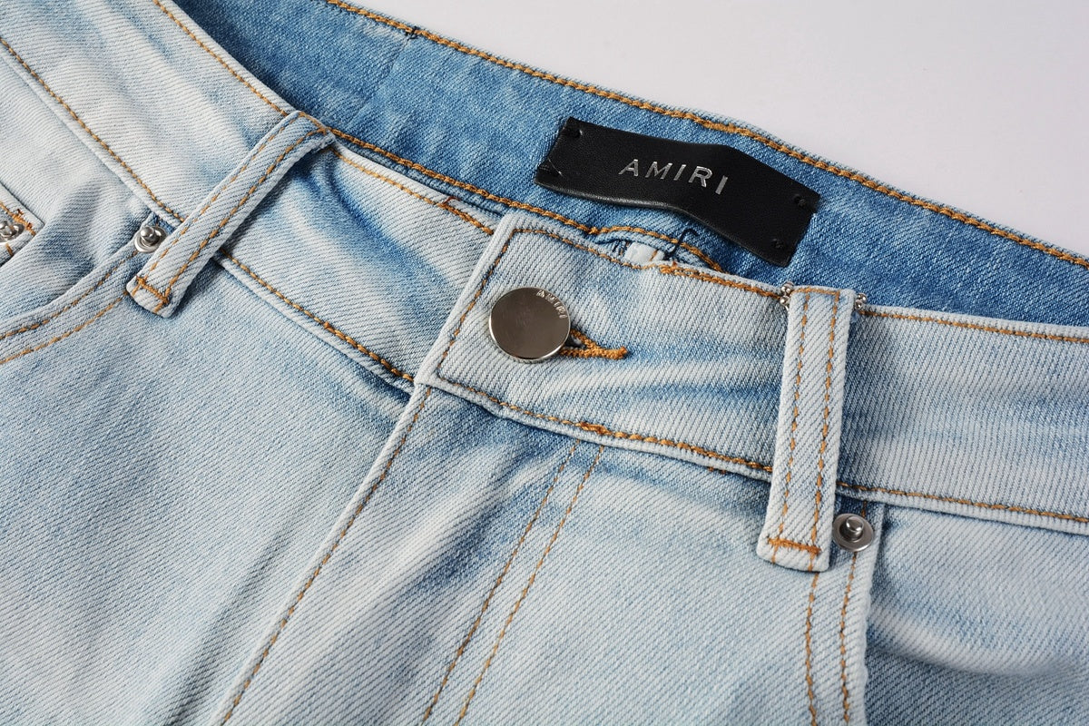 Amiri jeans light blue with paint splatter