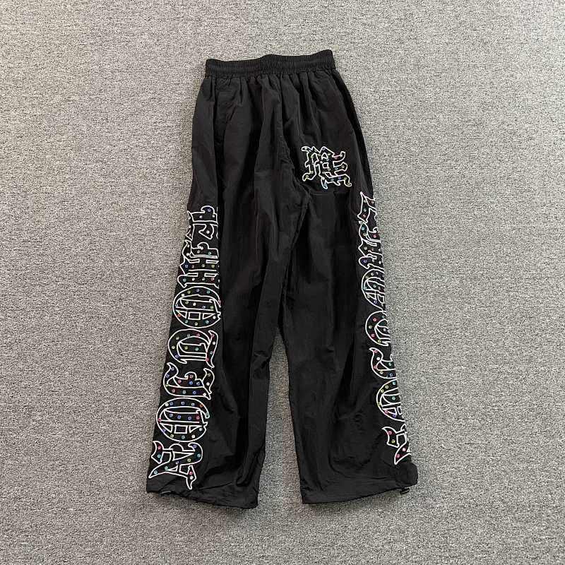 MIXED EMOTION RHINESTONE NAYLON TRACK PANTS