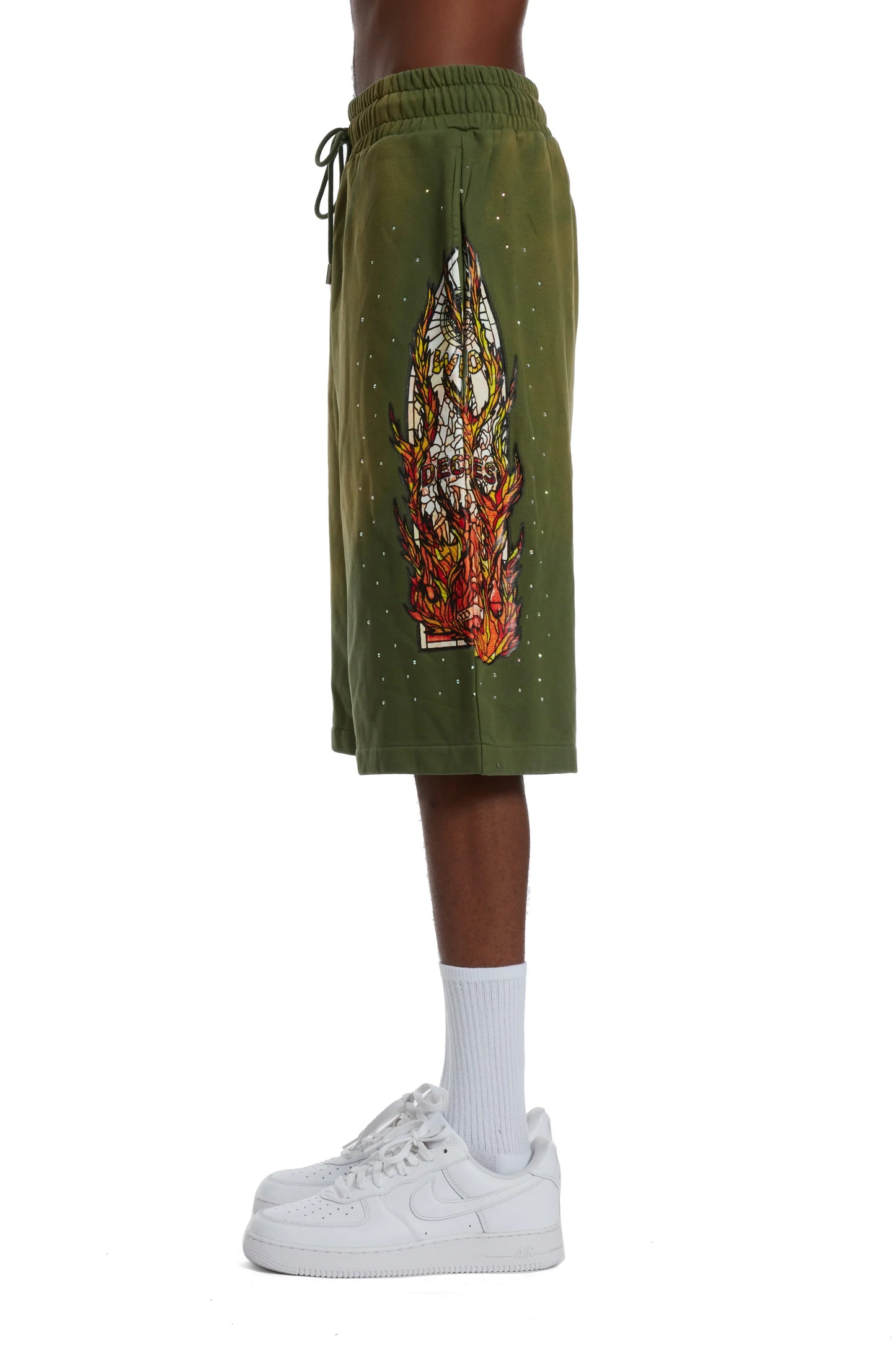 WHO DECIDES WAR green flame glass shorts
