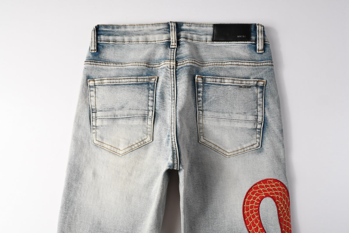 Amiri jeans light blue with  snake