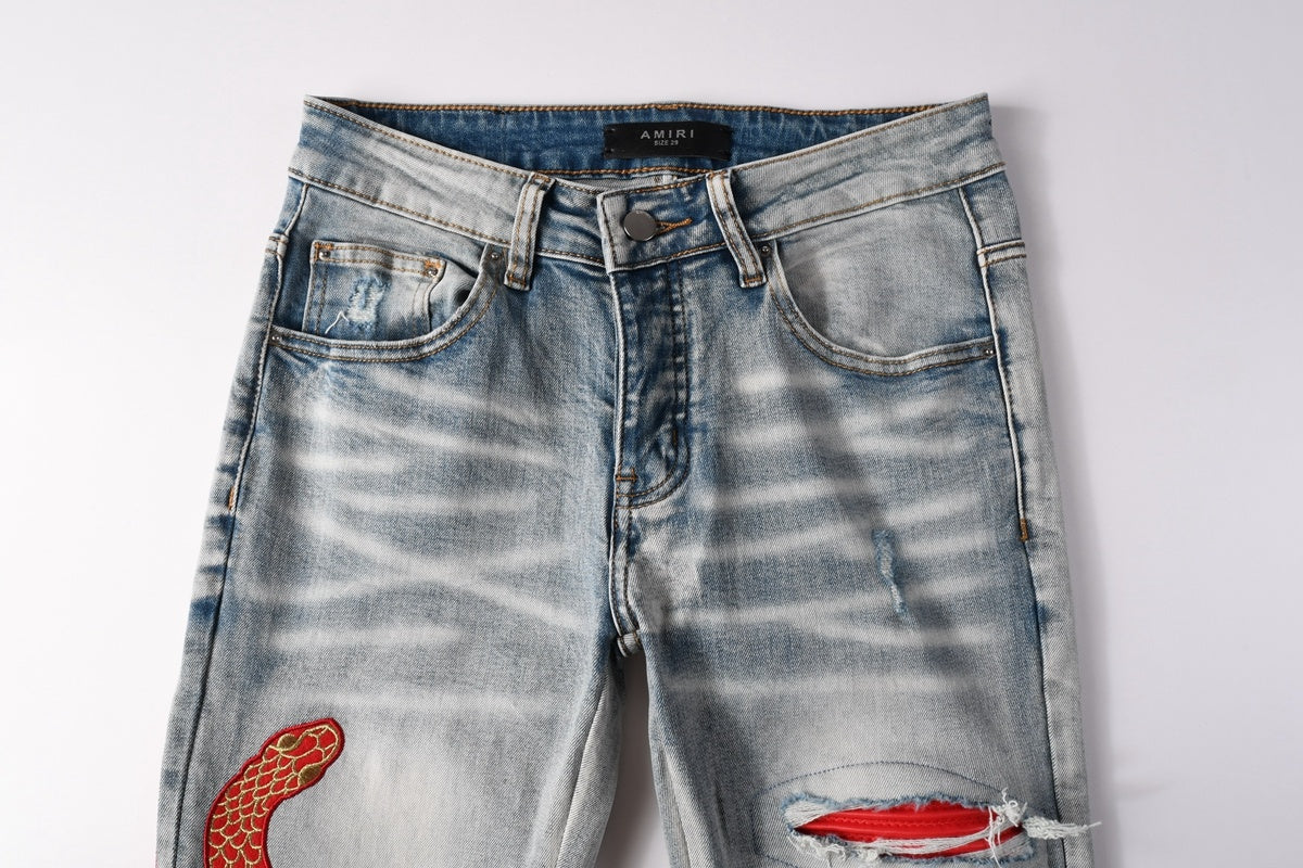 Amiri jeans light blue with  snake