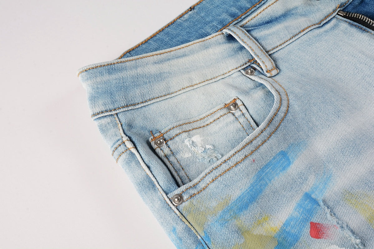 Amiri jeans light blue with paint splatter