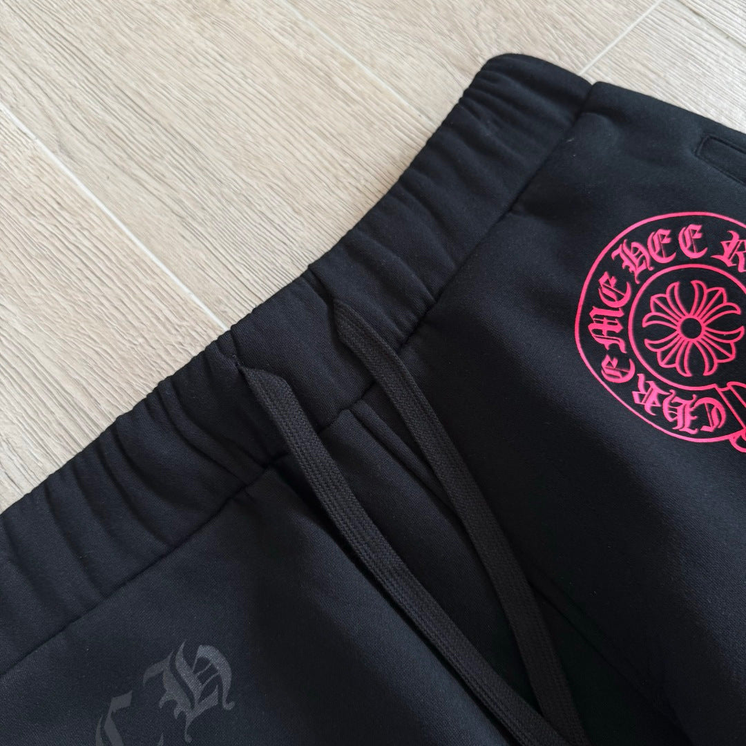 Black and pink chrome hearts sweatpants flared