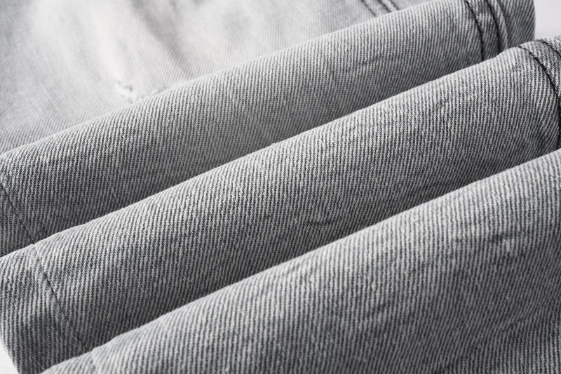 KSUBI denim light gray distressed skinny jeans