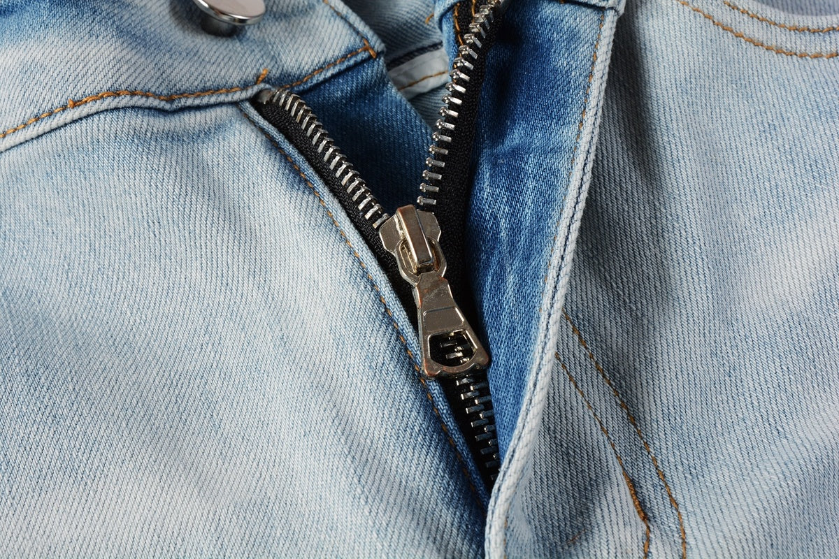 Amiri jeans light blue with paint splatter