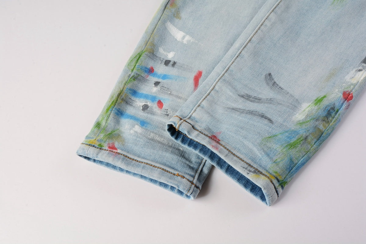 Amiri jeans light blue with paint splatter