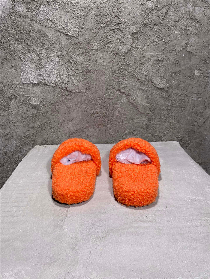 Balenciaga black furry slides orange