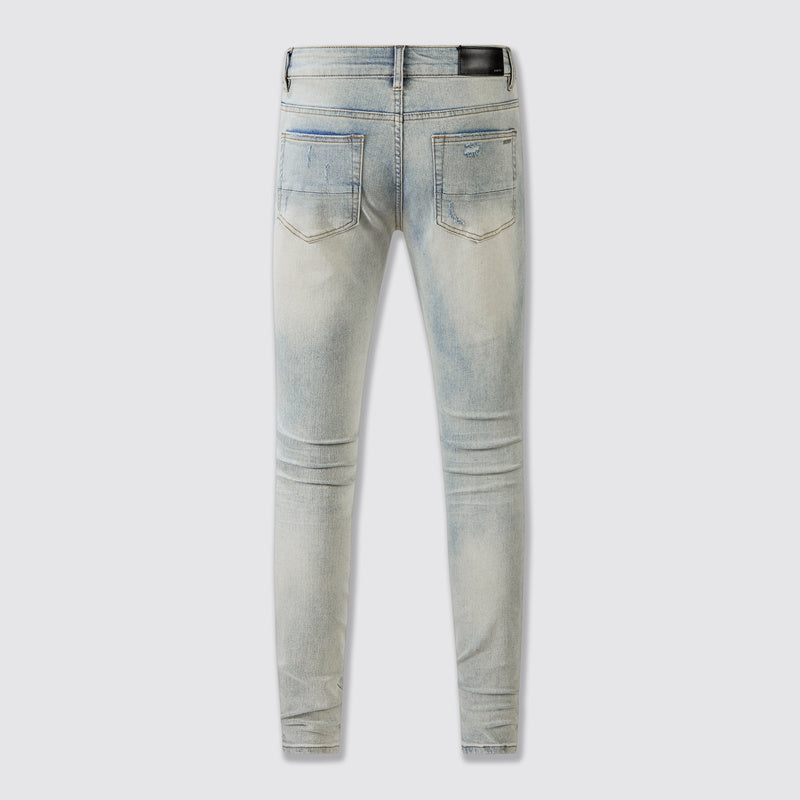 Amiri jeans light gray distressed