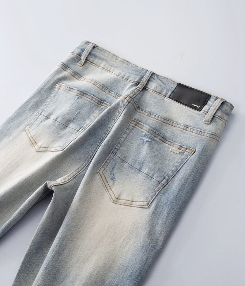 Amiri jeans light gray distressed