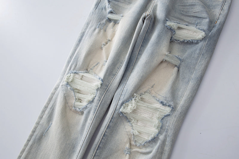 Amiri jeans light gray distressed