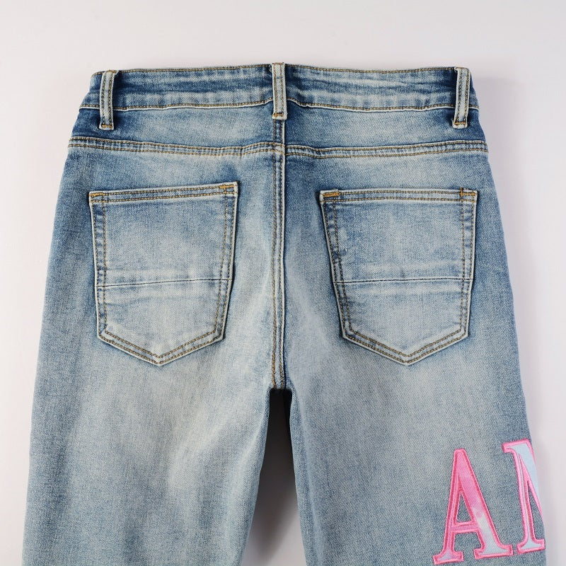 Amiri jeans blue denim with pink amiri patch