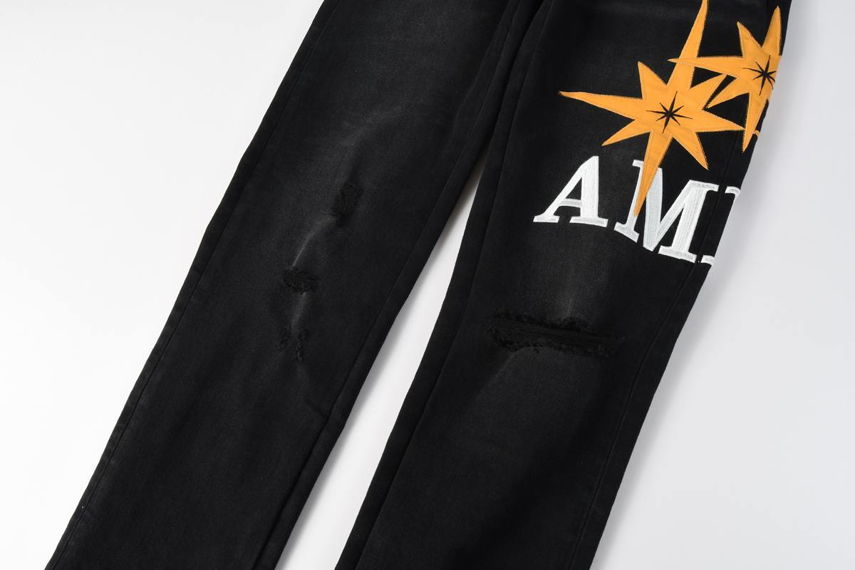 Amiri jeans black with yellow star  patch