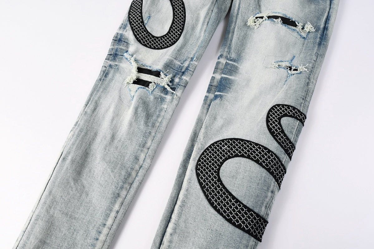 Amiri jeans light blue with back snake