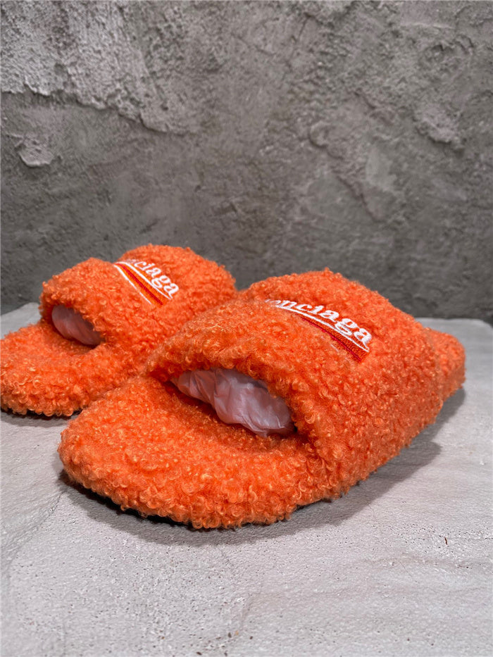 Balenciaga black furry slides orange