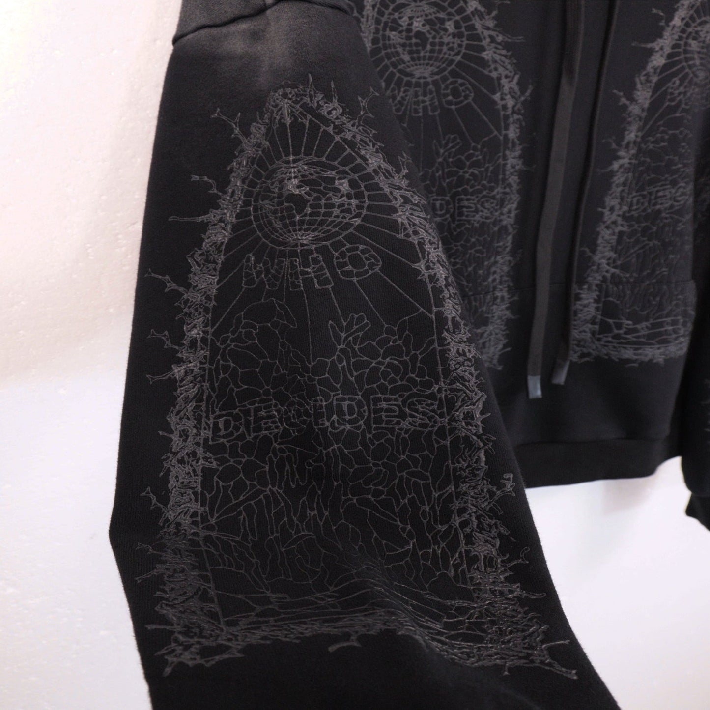 WHO DECIDES WAR
Thorned Hooded Pullover