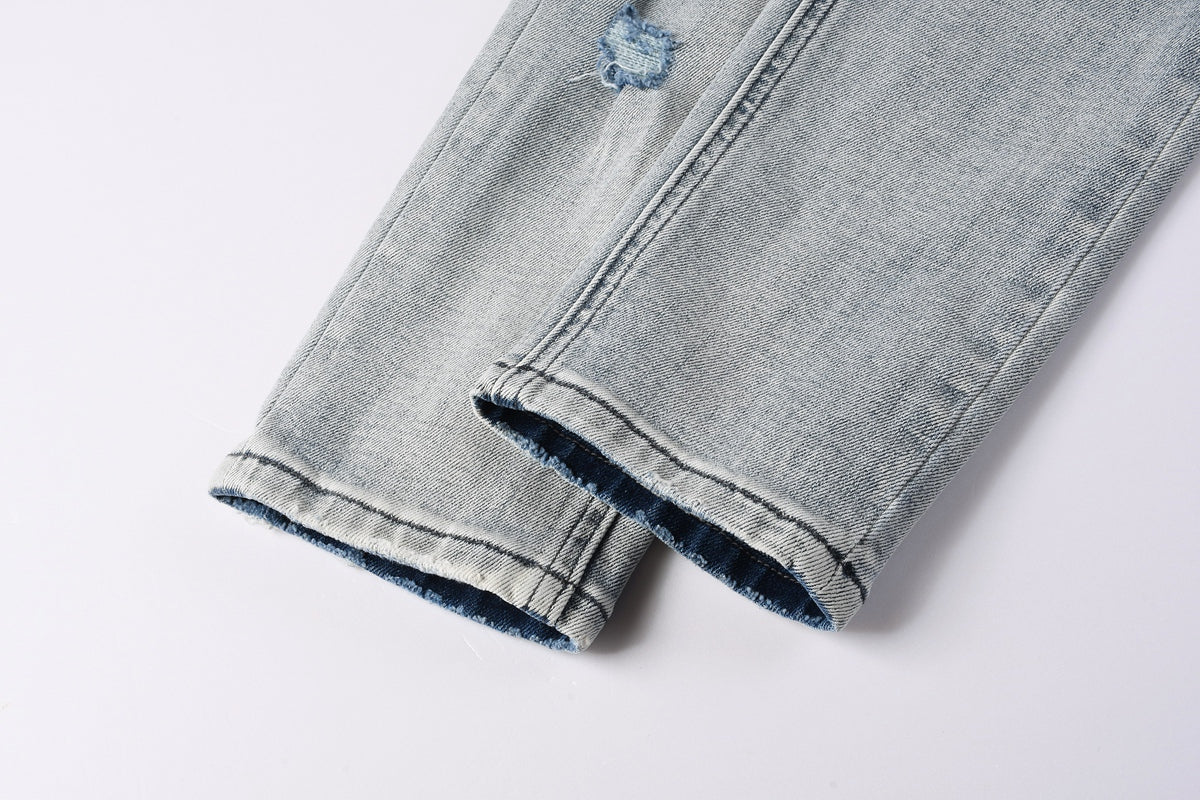 KSUBI denim light blue distressed skinny jeans with writing
