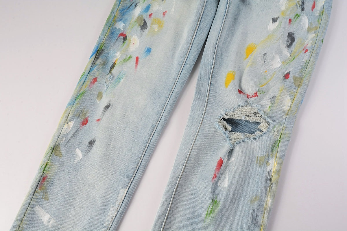 Amiri jeans light blue with paint splatter