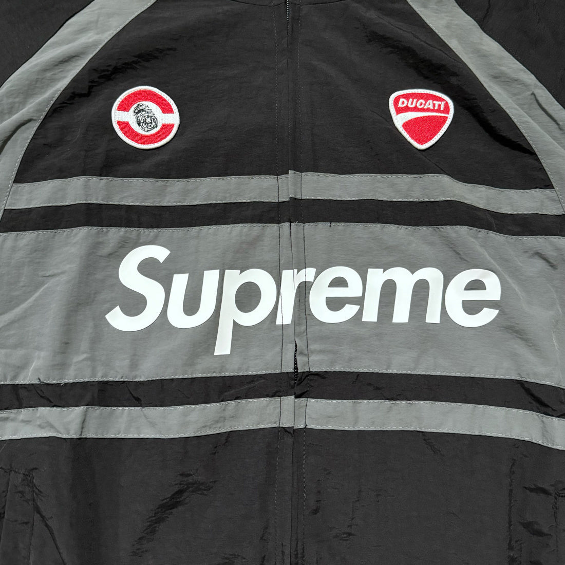 Supreme Ducati track jacket black gray and red