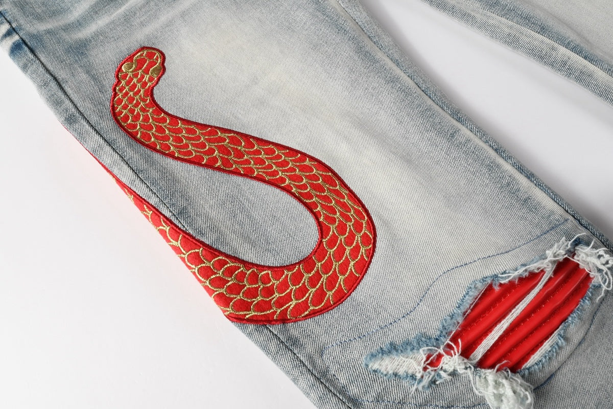 Amiri jeans light blue with  snake