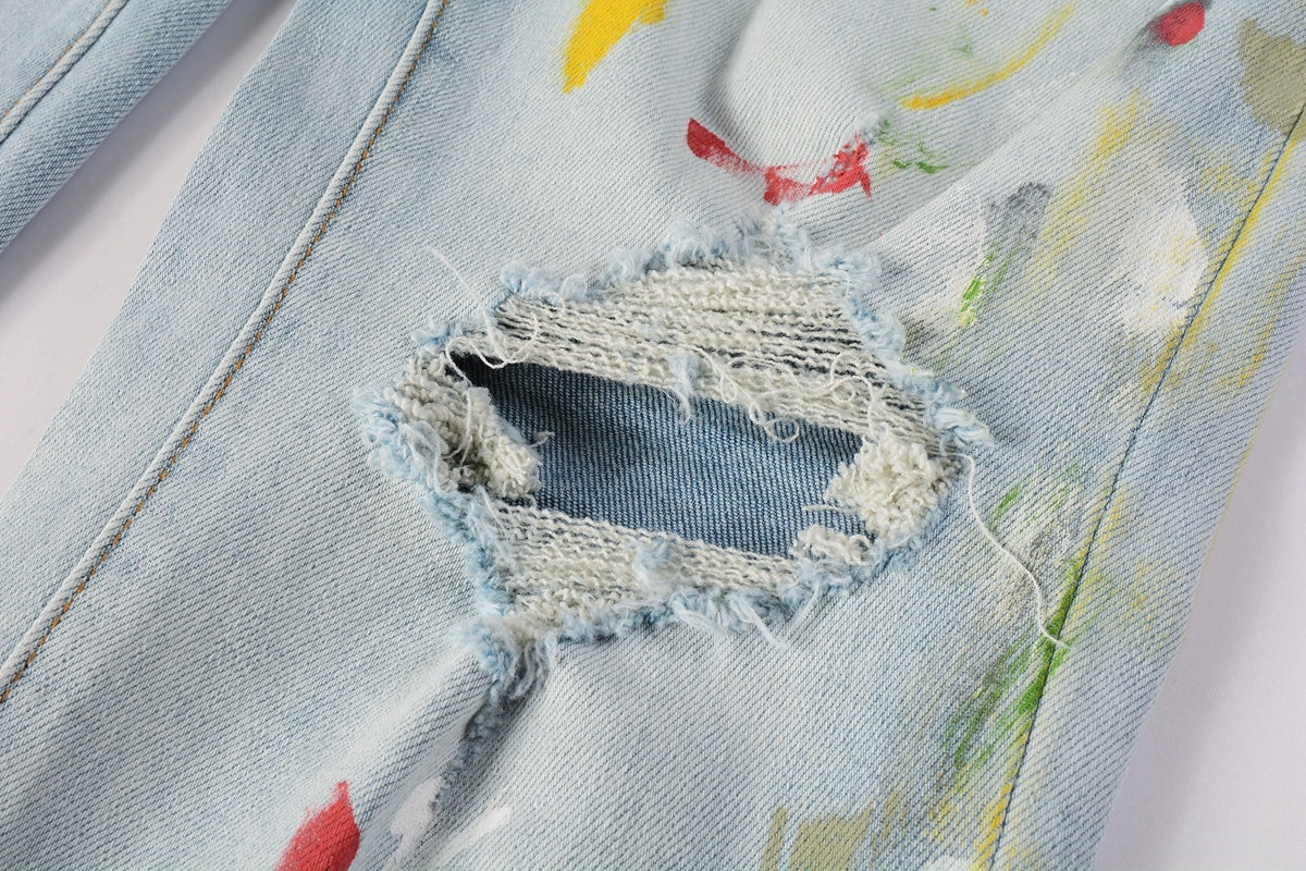Amiri jeans light blue with paint splatter