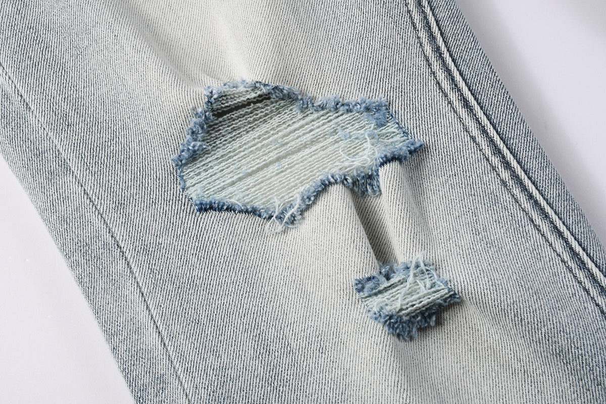 KSUBI denim light blue distressed skinny jeans with writing