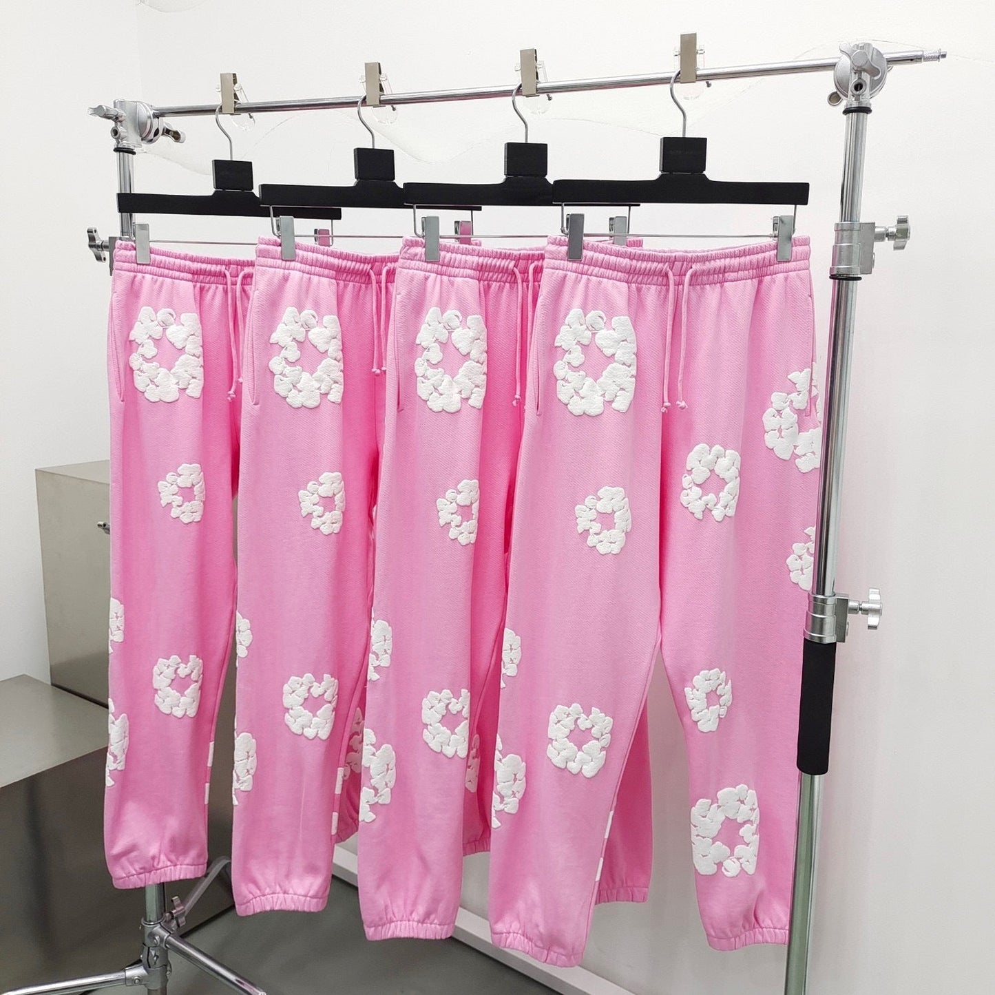 Pink denim tears sweatpants