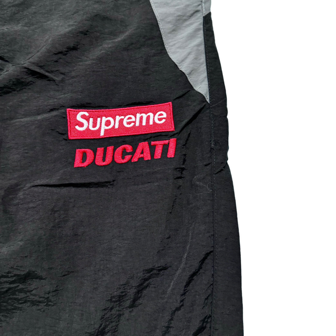 Supreme Ducati track pants black gray and red