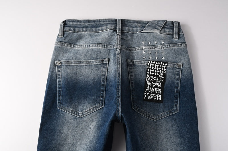 KSUBI denim dark blue lightly  distressed skinny jeans with white writing
