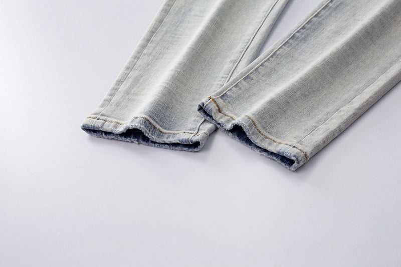 Amiri jeans light gray distressed