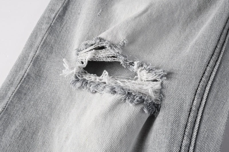 KSUBI denim light gray distressed skinny jeans