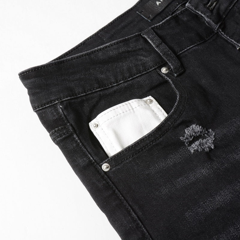 Amiri jeans black jeans with white logo