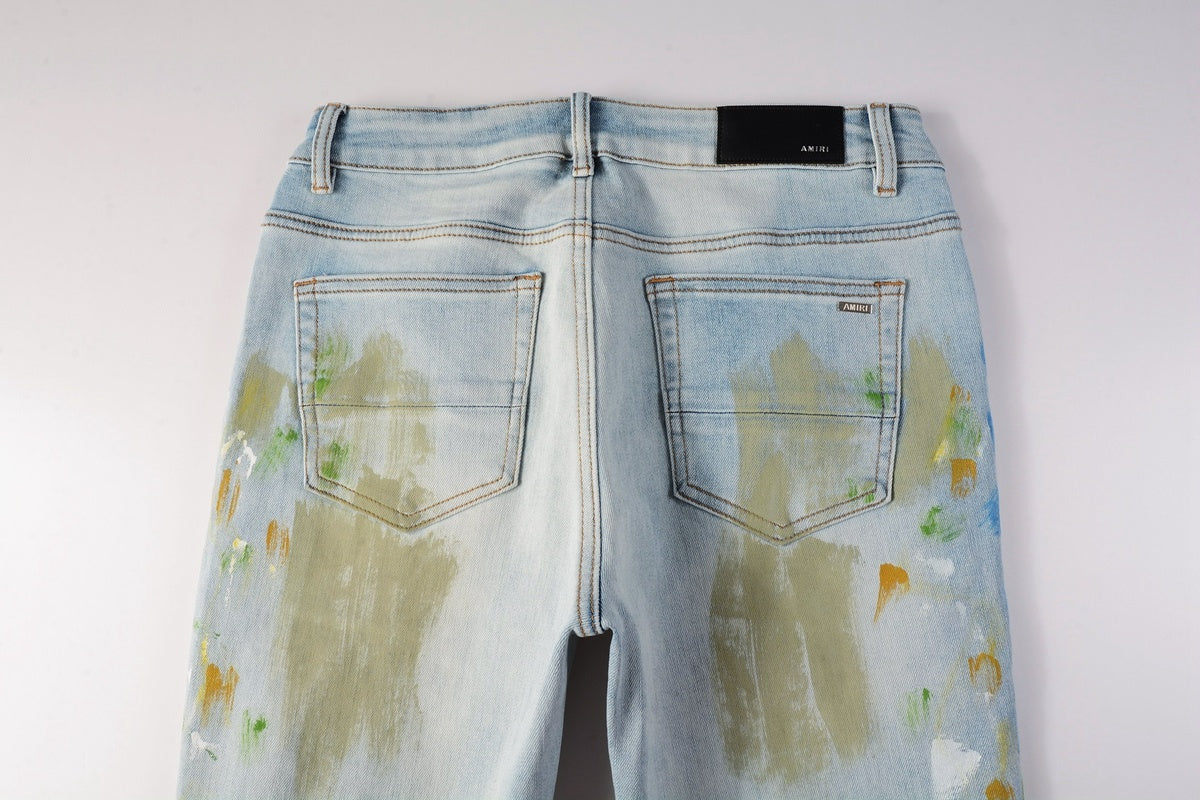 Amiri jeans light blue with paint splatter