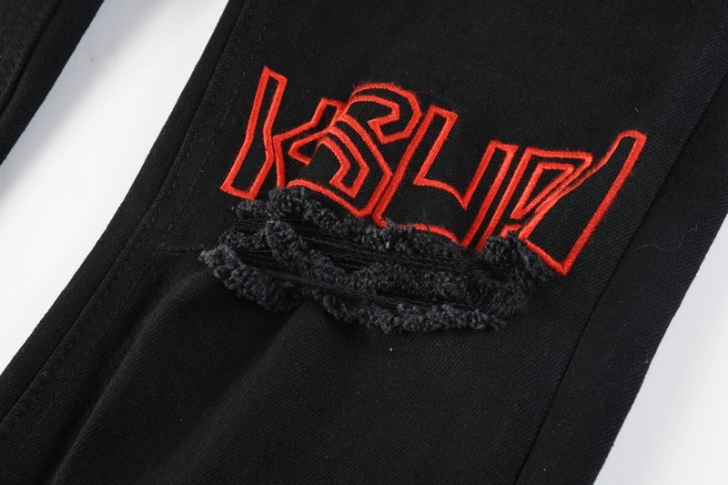 KSUBI denim black distressed skinny jeans red embroidered writing
