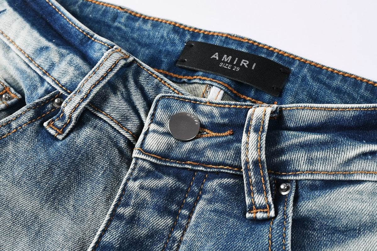 Amiri jeans light blue with back snake