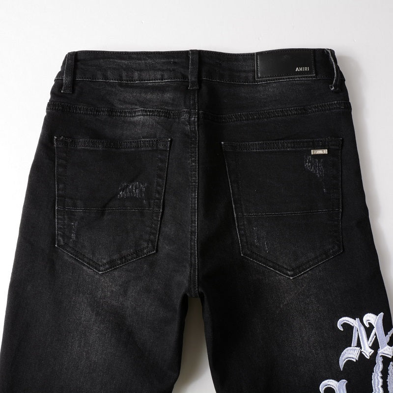 Amiri jeans black jeans with white logo
