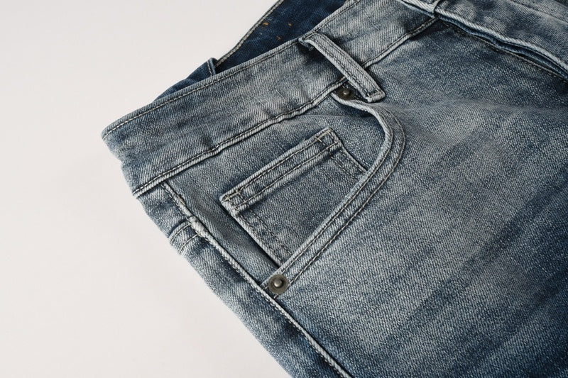 KSUBI denim dark blue lightly  distressed skinny jeans with white writing
