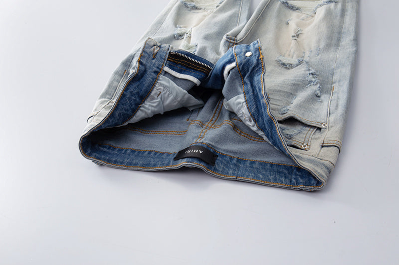 Amiri jeans light gray distressed