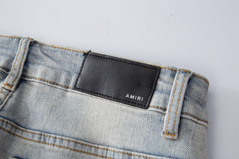 Amiri jeans light gray distressed