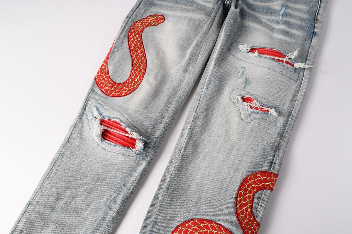 Amiri jeans light blue with  snake