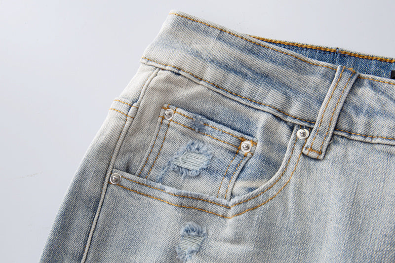 Amiri jeans light gray distressed