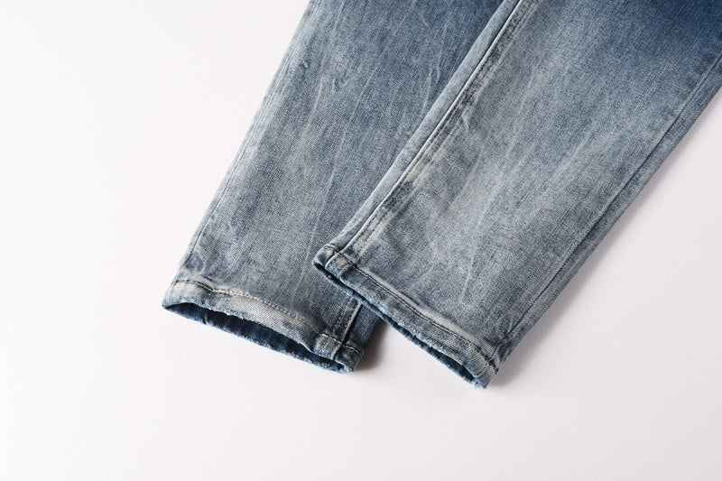 KSUBI denim dark blue lightly  distressed skinny jeans with white writing