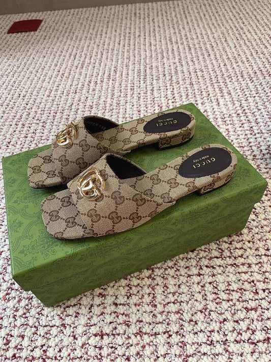 Gucci Women's Slide Sandals in sand and dark brown GG canvas.