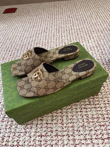 Gucci Women's Slide Sandals in sand and dark brown GG canvas.