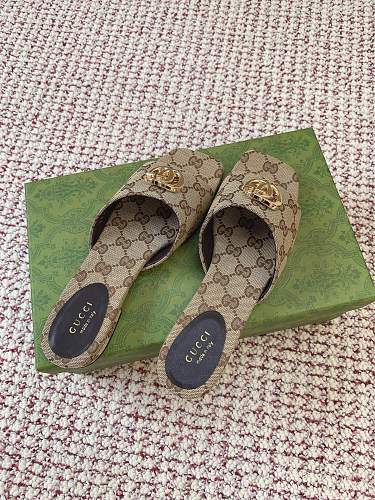Gucci Women's Slide Sandals in sand and dark brown GG canvas.