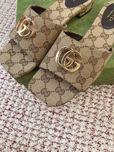 Gucci Women's Slide Sandals in sand and dark brown GG canvas.