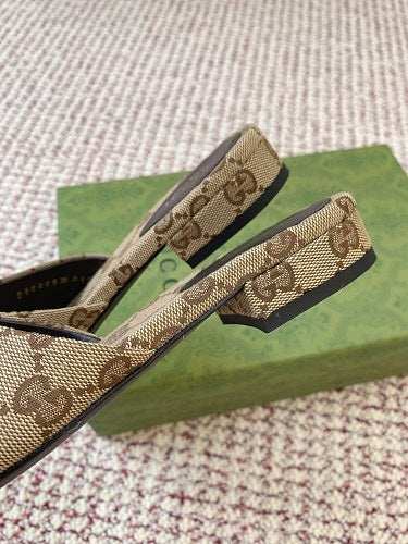 Gucci Women's Slide Sandals in sand and dark brown GG canvas.